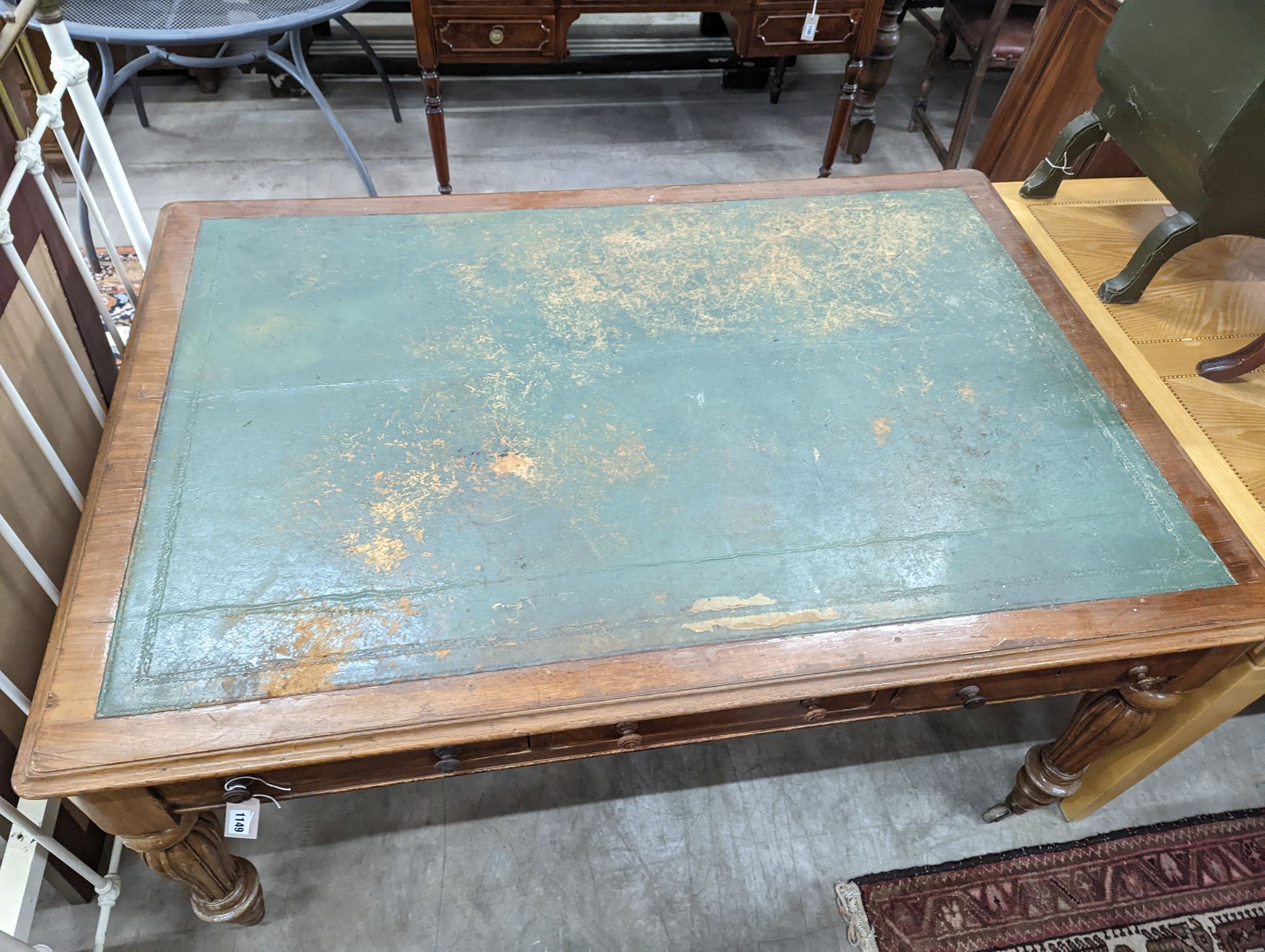 A Victorian mahogany partners writing table, width 150cm, depth 104cm, height 79cm